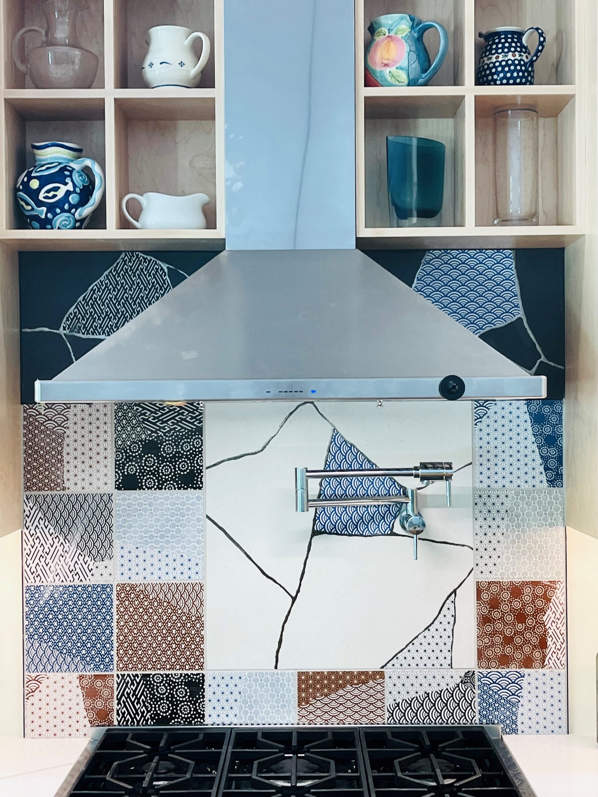 Colorful Patchwork Tile Backsplash in a Modern Kitchen