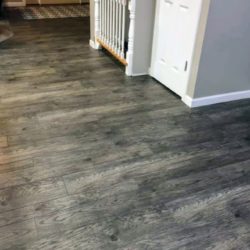 A Happy Customer Chooses Vinyl Plank Flooring